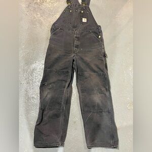 Distressed and worked in perfect Carhartt bib in faded black sized 38x32 fits 34